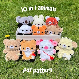 May include: A set of 10 crochet animal amigurumi patterns. The patterns include a bear, fox, cow, pig, panda, tiger, koala, bunny, and two other animals. The patterns are available as a PDF download. 10 in 1 animals pdf pattern.