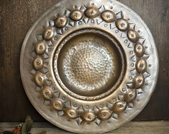 Decoración de pared con placa de cobre vintage