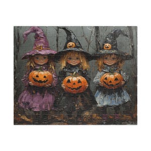 May include: Three young girls dressed as witches in purple, black, and blue dresses hold orange jack-o'-lantern pumpkins. They are standing in a forest setting.