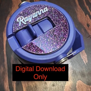 May include: A purple and silver glitter tumbler lid with the name "Rayanna" written on it. The lid has a flip top and is designed for a tumbler.