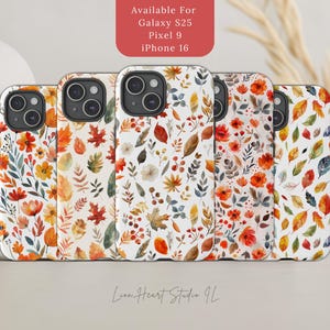 May include: Set of six phone cases with autumn-themed watercolor designs. The cases feature leaves, flowers, and berries in shades of orange, red, and yellow. The text "Available For Galaxy S25 Pixel 9 iPhone 16" is printed on the top of the image.