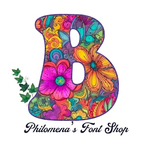 May include: A colorful, floral patterned letter B with a purple outline. The text "Philomena's Font Shop" is below the letter.
