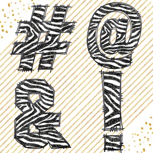 May include: Black and white zebra print font design with the symbols #, @, &, and ! on a gold striped background.
