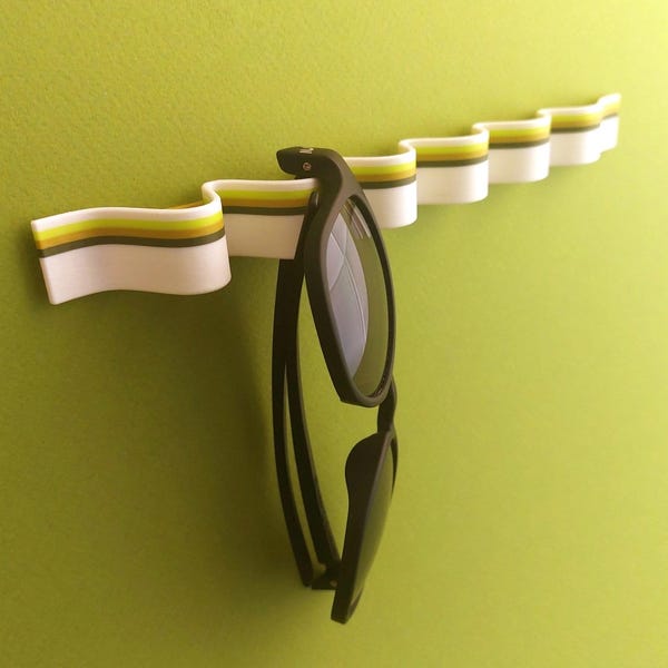 Soporte para gafas de sol con capacidad para 6 pares - Tiras de colores personalizables / Organizador de accesorios minimalista con diseño ondulado / Colgador de pared para vestíbulo