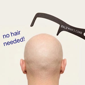 May include: A black, curved, handheld tool with a hole at one end, labeled BALD MAN'S COMB, positioned above a smooth, hairless scalp. The text no hair needed! appears in blue to the left of the tool and the scalp.