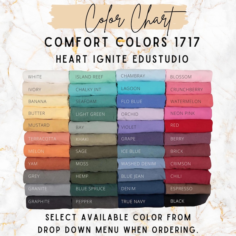 May include: Color chart featuring a variety of Comfort Colors 1717 fabric swatches. The chart displays a wide range of colors, including white, ivory, banana, mustard, terracotta, melon, yam, grey, granite, and graphite. Text at the bottom reads: "SELECT AVAILABLE COLOR FROM DROP DOWN MENU WHEN ORDERING."