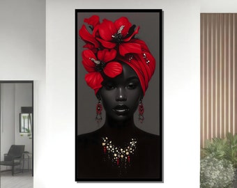 Puede incluir: Un retrato en blanco y negro de una mujer con flores rojas en el pelo y un turbante rojo. Lleva un collar y pendientes de oro.