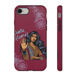May include: A burgundy phone case featuring an illustration of a woman with long dark hair and a hand raised in a stop gesture. The text "Auntie, Please!" is written in cursive. Floral designs decorate the case.