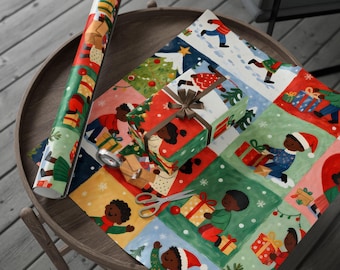 May include: Christmas-themed wrapping paper and a wrapped gift with a brown ribbon. The wrapping paper features a colorful pattern of children, gifts, and snowflakes. A roll of matching paper and scissors are also on the table.