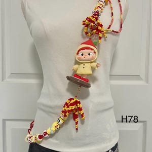 Handgemachte Handy Crossbody Handy Gurt Handbemalte Perlen mit Figur Spielzeug verstellbar Stil für Handy,Tasche,Schlüsselanhänger,Halskette