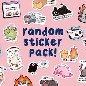 May include: A collection of colorful, cartoon-style stickers on a pink background. The stickers feature various quirky characters and phrases, including frogs, cats, and a blobfish. Text on the stickers includes "random sticker pack!", "I'm autistic and also a bitch", and "This is fine."