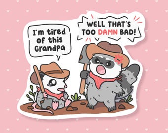 May include: A sticker featuring two cartoon animals in cowboy hats. One, an opossum, says "I'm tired of this Grandpa." The other, a raccoon, replies "Well that's too damn bad!" Both animals wear red bandanas.