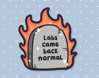 May include: A sticker featuring a gray tombstone engulfed in flames. The tombstone has the words "Labs came back normal" in black text. The background is light blue with white heart shapes.