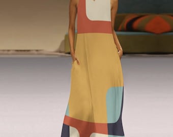 May include: A sleeveless maxi dress with a geometric pattern in shades of white, red, yellow, blue, and black. The dress has a v-neck and pockets on the sides.