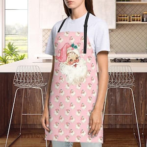 ピンクサンタホリデーエプロンMCMレトロエプロンキッチュMCMグリルマスター-ミッドモッドキッチン、50年代キッチンデコレーション