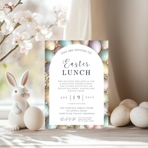 May include: An invitation to an Easter lunch with a pastel coloured egg design. The invitation includes the date, time, location, and RSVP information. The text reads: "You are invited to Easter Lunch. Hop on over and join us for a delicious Easter lunch, egg-citing activities, an Easter egg hunt, laughs and Easter cheer. Apr 19 2025. 12 noon until 3pm. The Carlisle Family Home 1111 Joyful Road Fortitude Valley, Brisbane. RSVP to Lisa-Maree xxxx by 12 April 2025."