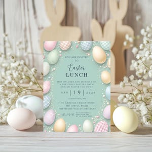 May include: A light blue invitation card with a pastel colored Easter egg design. The text reads "You are invited to Easter Lunch. Hop on over and join us for a delicious Easter lunch and an Easter egg hunt. Apr 19 2025 12 noon until 3pm. The Carlisle Family Home 1111 Joyful Road Fortitude Valley, Brisbane. RSVP to Lisa Maree 04xx xxx xxx by 12 April 2025."
