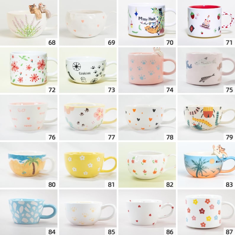 May include: A selection of ceramic mugs with diverse designs. Some mugs display floral patterns, while others feature heart, paw print, or cartoon illustrations. The mugs are available in various colours, including white, pink, blue, and yellow.