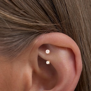 May include: A rustic wooden sign with the text "Welcome to our home" in white lettering. The sign has a distressed finish and a simple, inviting design, ideal for entryway decor.