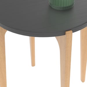 Detailed close-up of exposed wood joinery where the curved table legs connect to the round tabletop. Modern CNC woodworking project files for a versatile round side table, bedside table, or plant stand. DIY-friendly furniture plans include SVG, DXF, and printable PDFs for easy fabrication with CNC routers. Compact design for small hobby CNC machines, optimized for 18mm plywood or hardwood. Flat-pack assembly with clean, hidden joinery—ideal for home decor or small-space furniture projects.