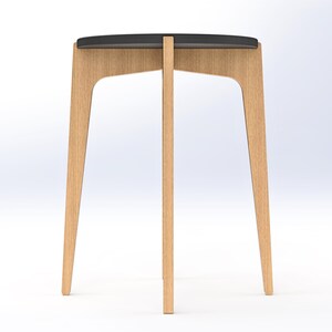Side view of small modern end table or plant stand with a round top and curved legs. DIY CNC router project for a round, modern end table that doubles as a plant stand or bedside table. Digital woodworking plan with CNC-ready DXF and SVG files, printable PDF templates, and detailed assembly drawings. Flat-pack friendly furniture with sleek, interlocking joinery