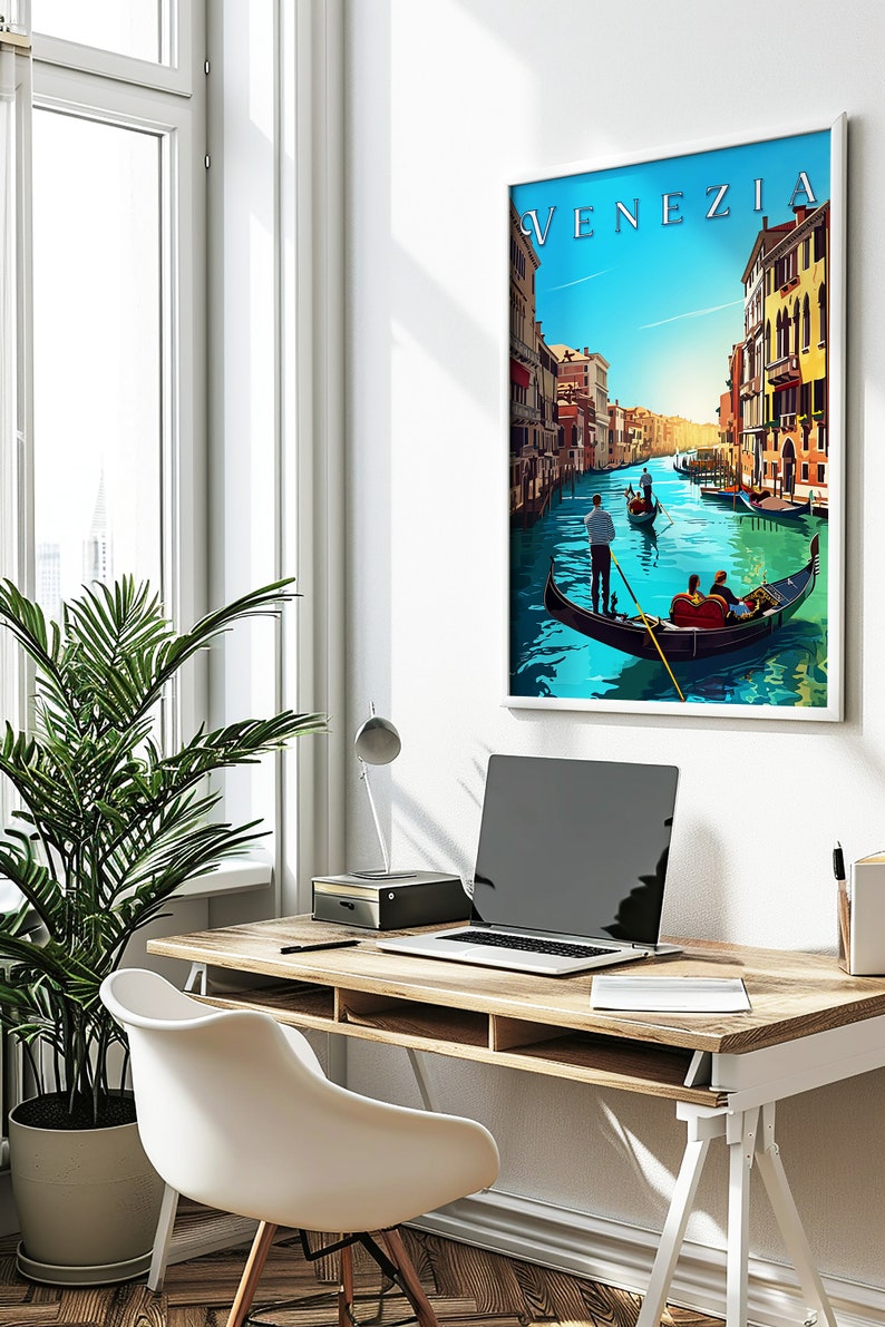 May include: A framed poster with a colorful illustration of a canal in Venice, Italy. The poster features the word "VENEZIA" in a stylized font at the top. Gondolas are seen in the canal with people in them.