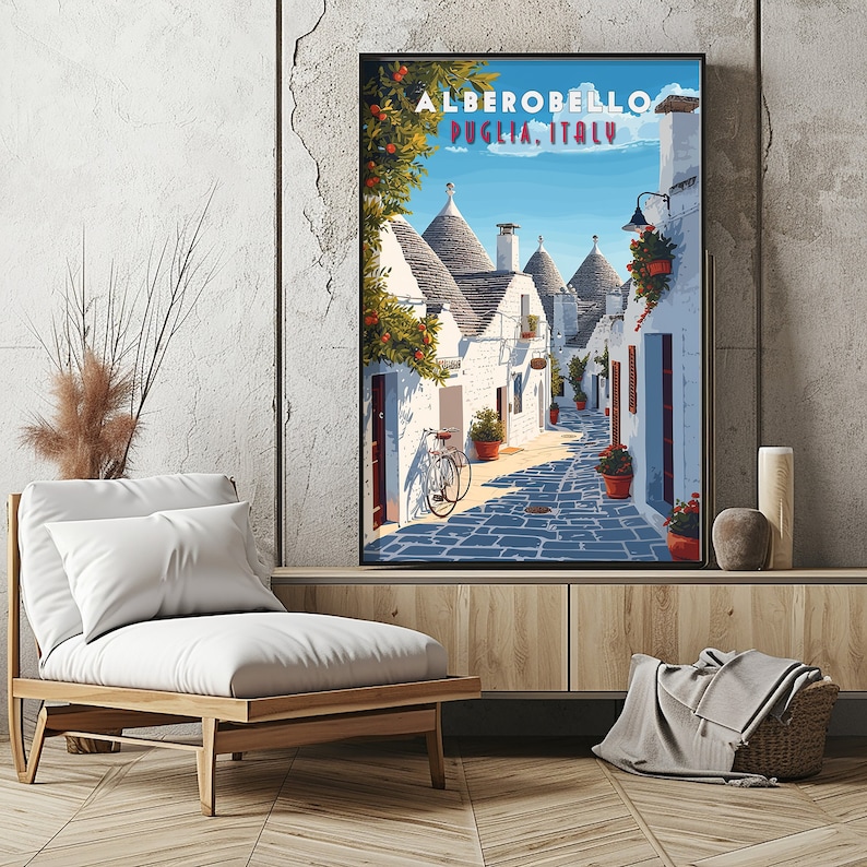 May include: A vintage travel poster featuring a narrow street in Alberobello, Puglia, Italy. The street is lined with white buildings with conical roofs, known as trulli. A bicycle is parked on the cobblestone street.