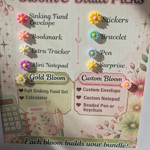 May include: A framed sign titled Bloom & Build Picks with floral graphics. It lists options like Sinking Fund Envelope, Bookmark, Stickers, and Bracelet, each marked with a small flower icon. The text includes Choose your binder + theme and Each bloom builds your bundle!