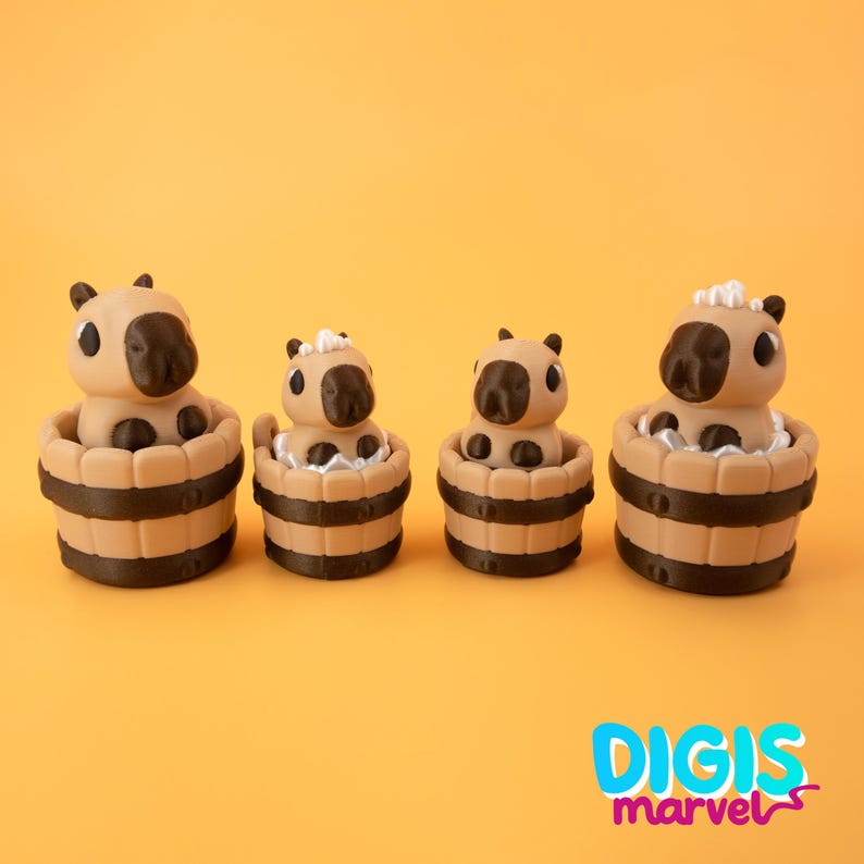 May include: Four capybara figurines in wooden tubs with dark brown stripes. The capybaras have light brown bodies, dark brown faces, and black eyes. The tubs are filled with white foam, and the background is a solid orange.