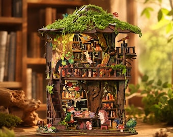 May include: A multi-level wooden treehouse miniature kit featuring a moss-covered roof, internal bookshelves, and small animal figurines including a fox, rabbit, and hedgehog. The structure includes a balcony, a ladder, and miniature tea sets.