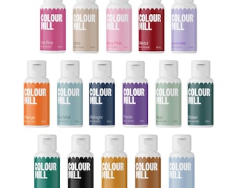 May include: A set of 18 small bottles of food colouring, labelled "Colour Mill". The bottles are arranged in three rows of six, with each row featuring a different colour palette. The colours include hot pink, latte, baby pink, merlot, lavender, orange, sea mist, midnight, purple, sage, ocean, emerald, black, caramel, day, and blue bell.