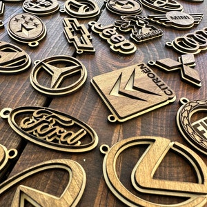 Laser cut vehicle car logo keychains with FREE display stand Svg file