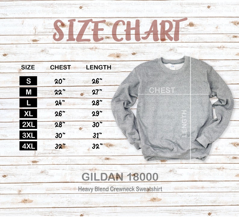 May include: A size chart for a gray Gildan 18000 heavy blend crewneck sweatshirt. The chart lists sizes S to 4XL, with chest measurements from 20" to 32" and lengths from 26" to 32". The sweatshirt is shown with chest and length indicators.
