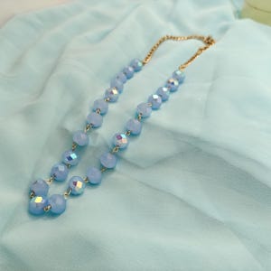 Stunning light blue glass beaded jewelry set of earrings and adjustable necklace