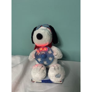 Snöflingornas animerade musikal Aviator Snoopy lyser upp propellern och spelar Linus Lucy