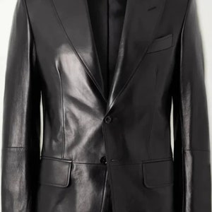 May include: A black leather blazer with a single button fastening and a classic notched lapel.