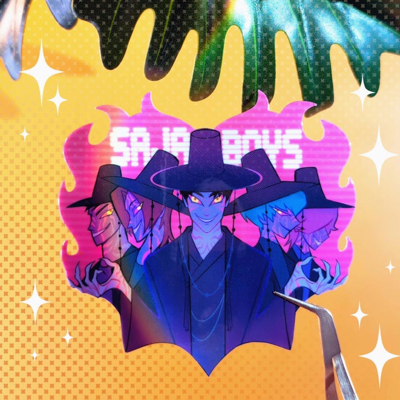 May include: A sticker featuring a group of stylized figures wearing traditional Korean hats and robes. The figures have glowing yellow eyes and are set against a pink and purple background with the text "SA JA BOYS". The sticker has a flame-like border.