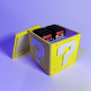 Titular de la tarjeta de juego Nintendo Switch Mario Question Cube