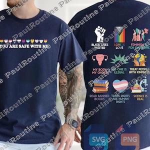 May include: Navy blue t-shirt with various LGBTQ+ pride flags and the text "YOU ARE SAFE WITH ME" on the front. The back features social justice slogans and symbols, including "Black Lives Matter" and "Love is Love."