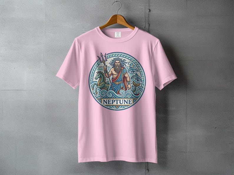Pink t-shirt with a circular graphic of Neptune holding a trident with sea creatures.