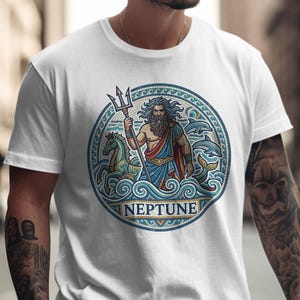 T-shirt with Neptune design, trident, horses, and dolphins.