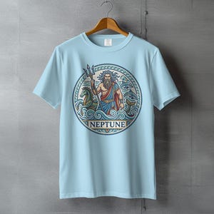 Light blue t-shirt with Neptune illustration, holding trident, riding seahorse.