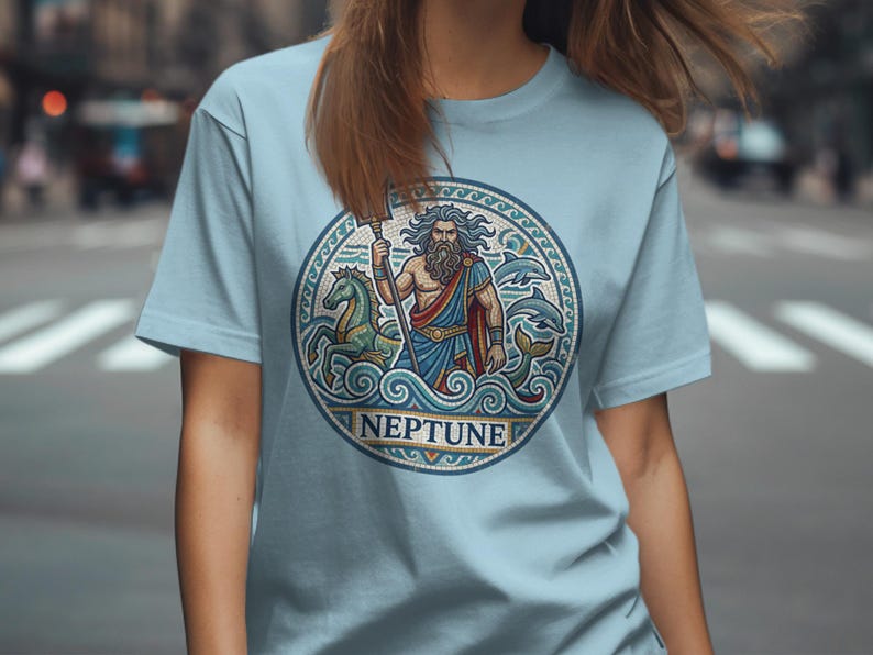 Light blue t-shirt featuring a circular mosaic of Neptune with a trident and horse.
