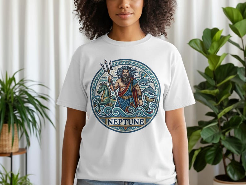 Circular graphic on white t-shirt depicting Neptune with trident and horses.