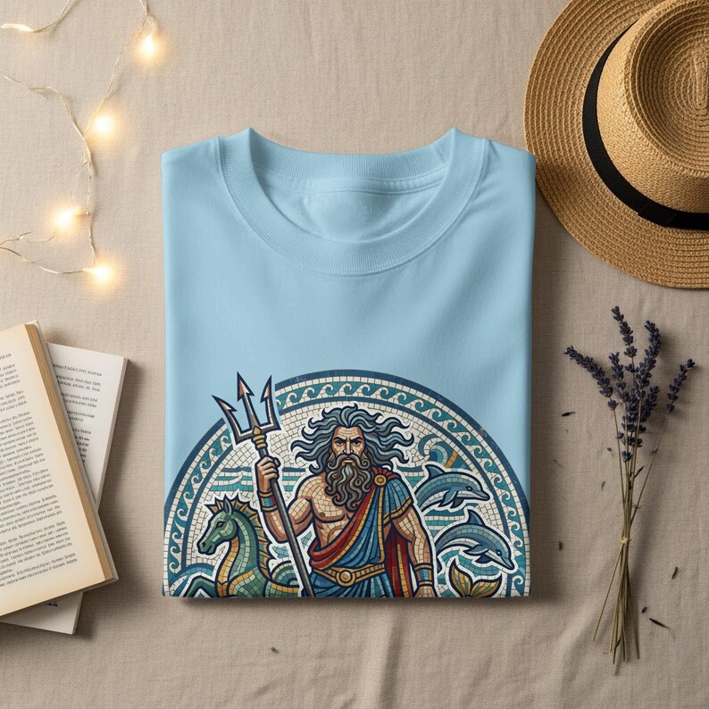 Light blue t-shirt with Poseidon design and mosaic border.