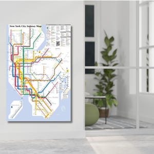 May include: A New York City Subway Map poster featuring a complex network of multicolored transit lines on a light blue background. The map includes a detailed legend, station markers, and clear labels for Manhattan, Queens, Brooklyn, and Staten Island.
