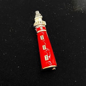 Vintage Plainville Stock Co PS CO ondertekend rood emaille strass vuurtoren pin broche