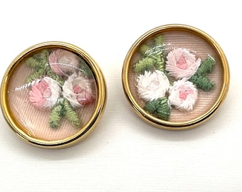 Vintage floral embroidered clip on earrings, tiny pink flowers inside a case with gold tone back and clips.