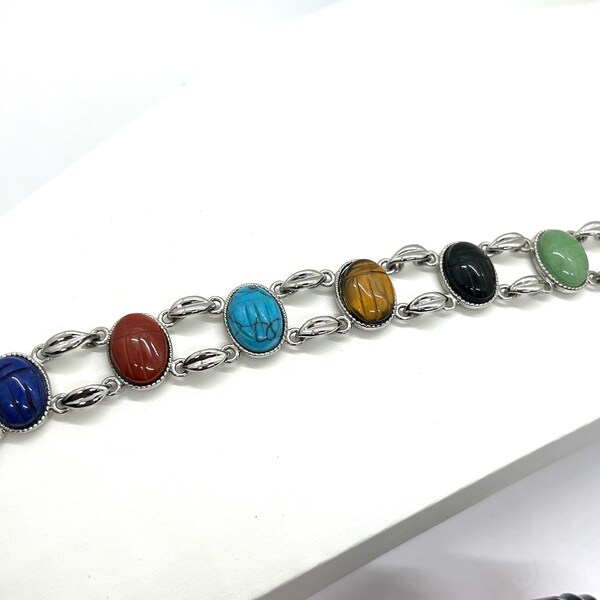 Vintage, Silver Tone, Scarab Bracelet, Carved, Faux Stones in Dark Blue, dark red, light blue, Cat’s Eye, Black and Light Green.