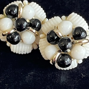 Vintage West Germany signed White pressed beads black beads silver tone spacers clip on earrings